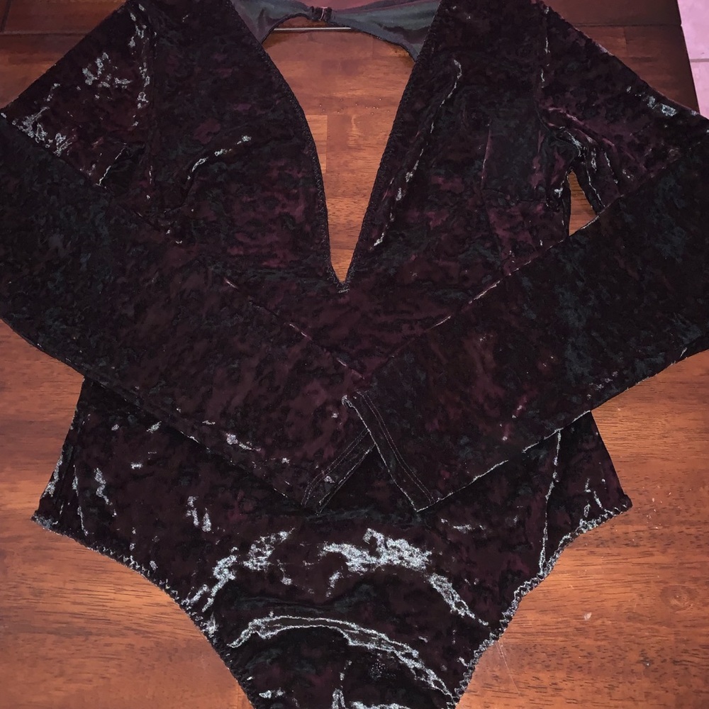 VS suede long sleeve thong bodysuit.